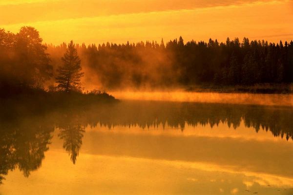 Canada, Manitoba Sunrise over Whiteshell River